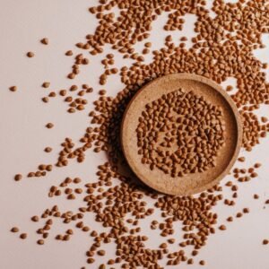 Raw buckwheat groats in a cork dish